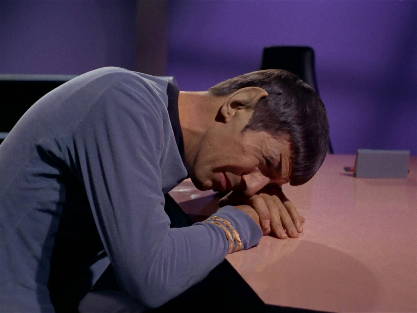 Spock fought his overwhelming feelings but while infected with a contagion, he succumbs to his emotions, resting his head on his hands at the table in 'The Naked Time'