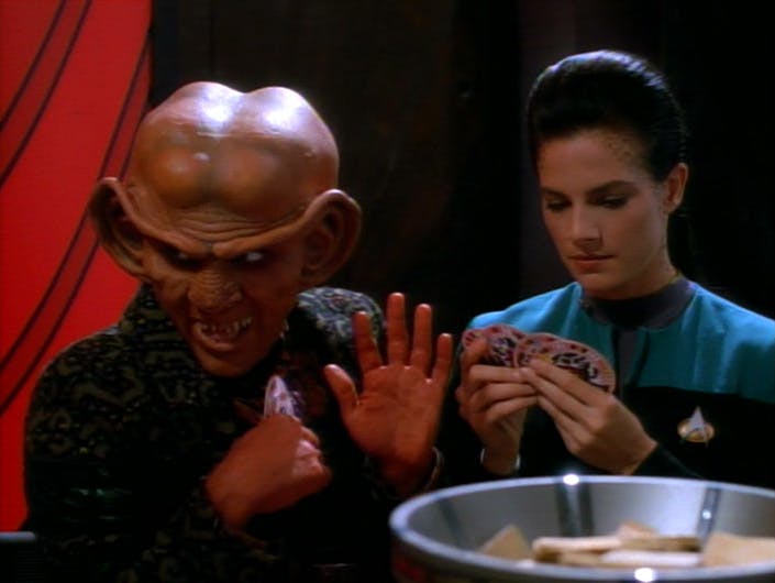 Quark plays a late night card game Tongo with Jadzia Dax in 'Rules of Acquisition'