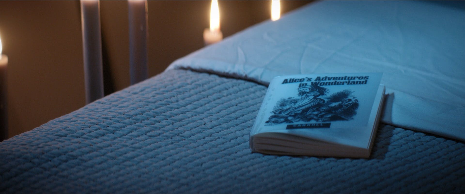 Michael Burnham's copy of Alice's Adventures in Wonderland lays on her bed in crew quarters in 'Brother'