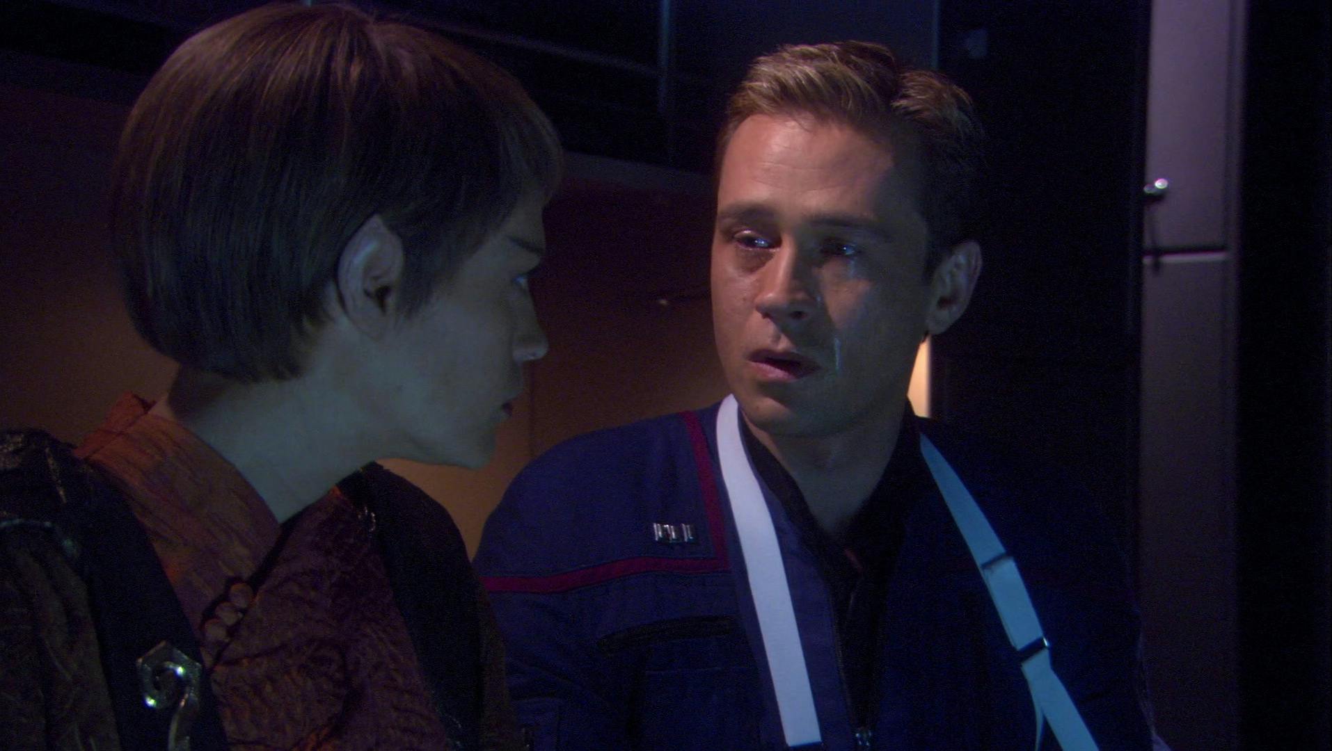 Mournng the loss of their cloned daughter, T'Pol and Trip Tucker sit together finding solace in their shared grief in 'Terra Prime'