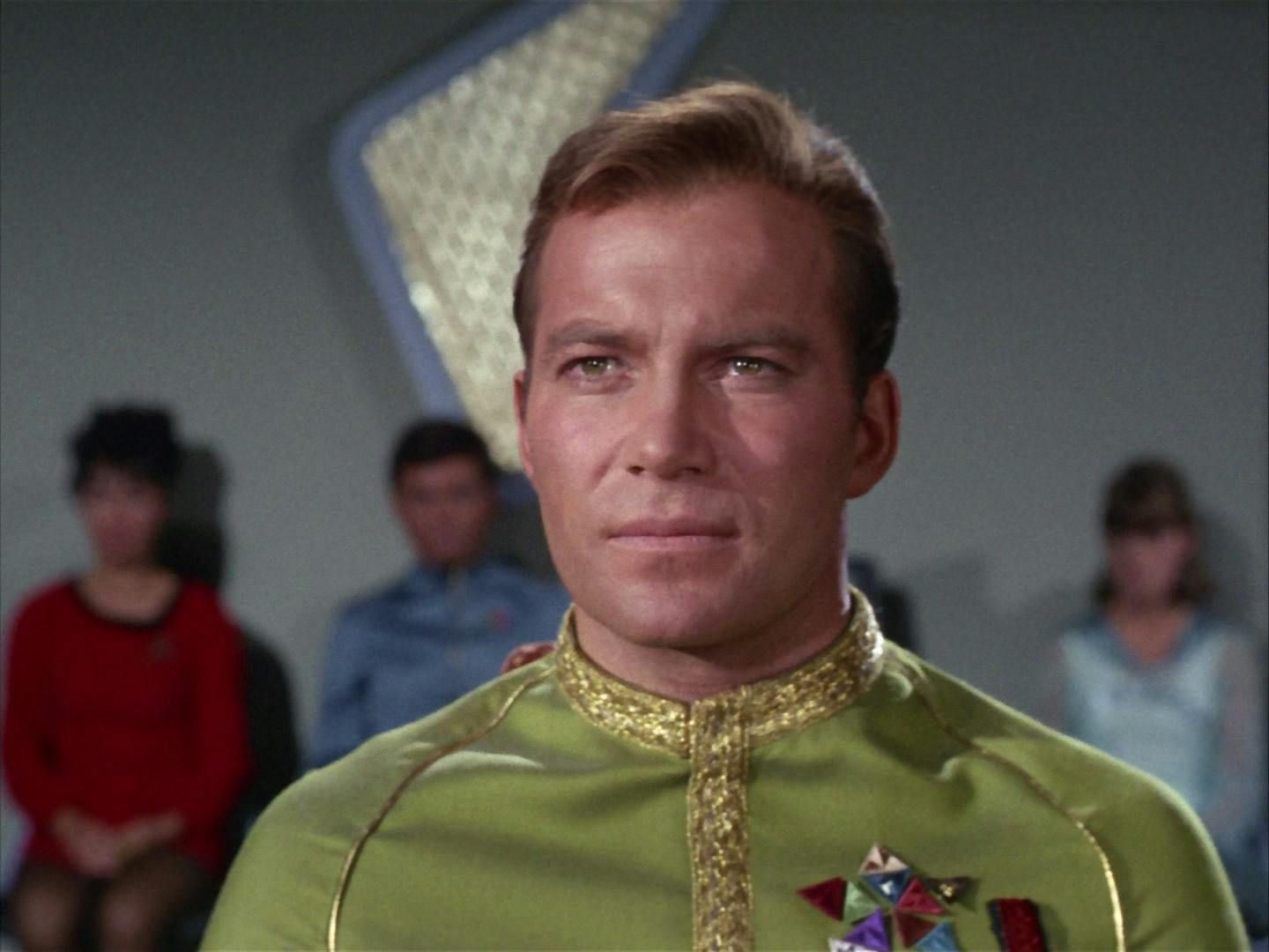 In his formal dress, James T. Kirk stands in front of a tribunal in 'Court Martial'