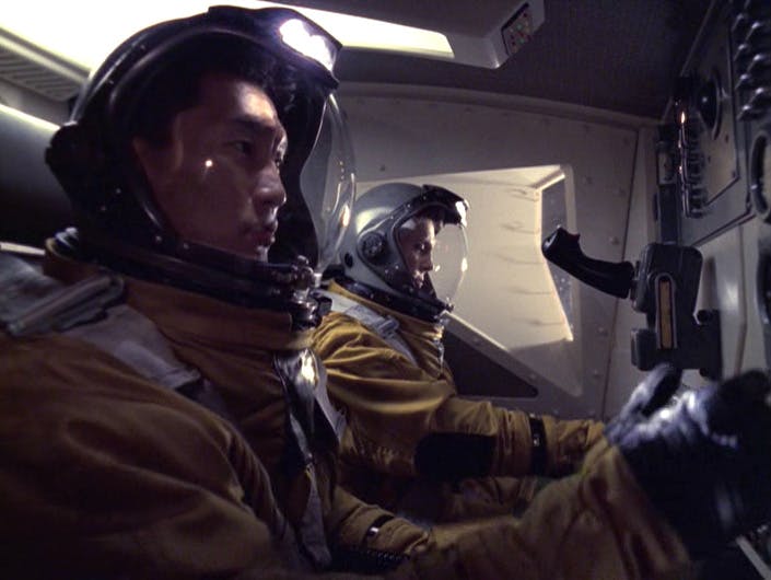 In the Orbital 1 manned capsule, Gotana-Retz pilots as Commander Terrina sits beside him in 'Blink of an Eye'