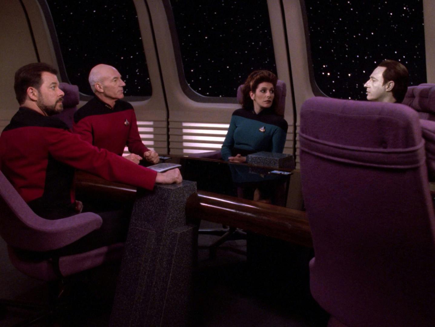 Picard consults with Riker, Troi, and Data in the Observation Lounge in 'All Good Things...'