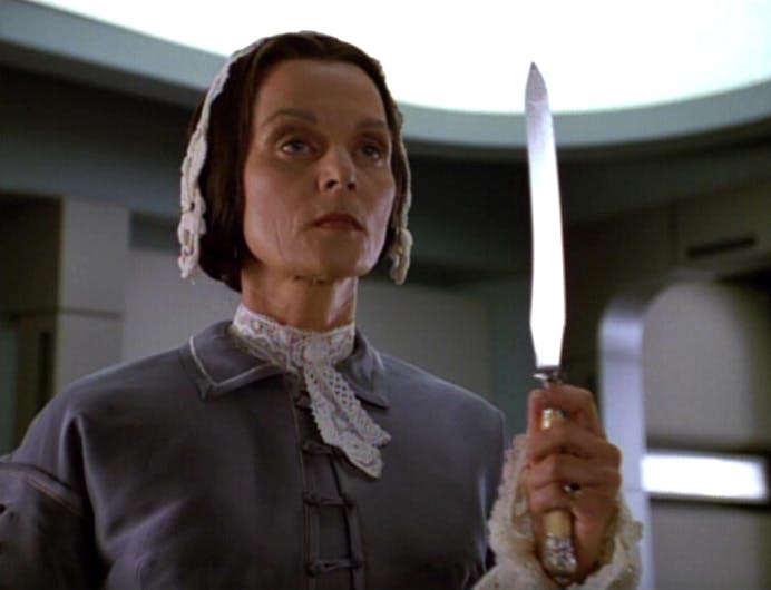 Mrs. Templeton, the housekeeper from Janeway's preferred holonovella, appears with a knife and begins to attack Janeway in 'Persistence of Vision'