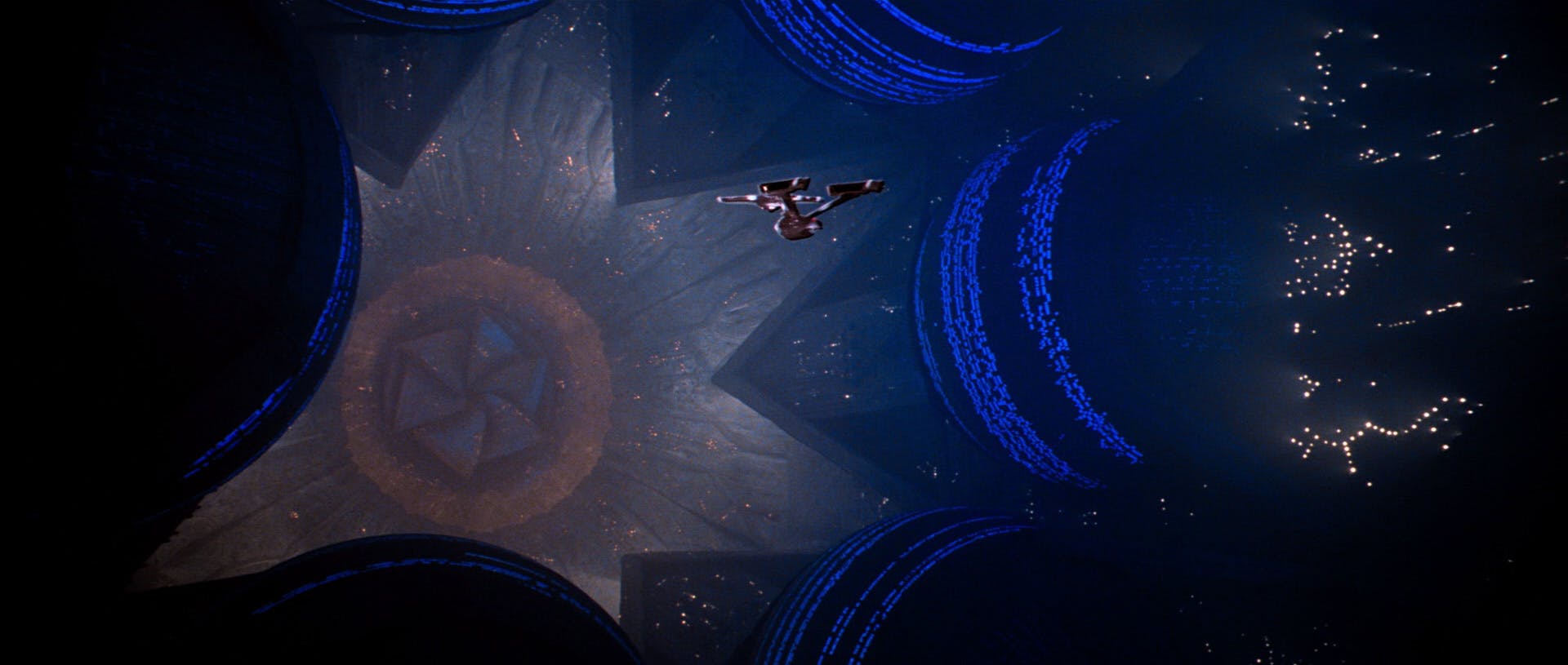 The Enterprise heads through the center of an alien cloud towards V'ger in Star Trek: The Motion Picture