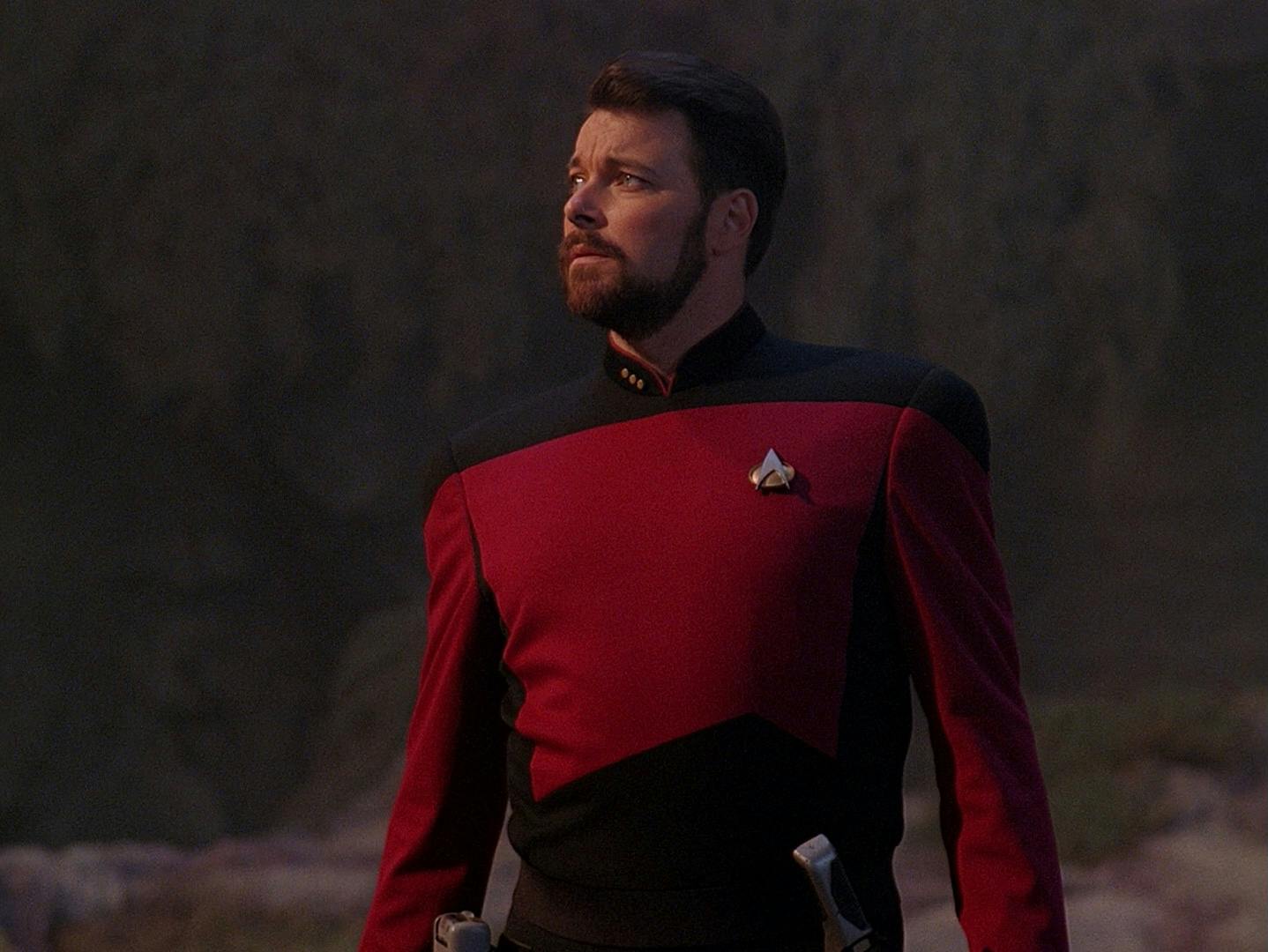 On the surface of a planet, Riker stands and looks out towards the horizon in 'The Best of Both Worlds, Part I'