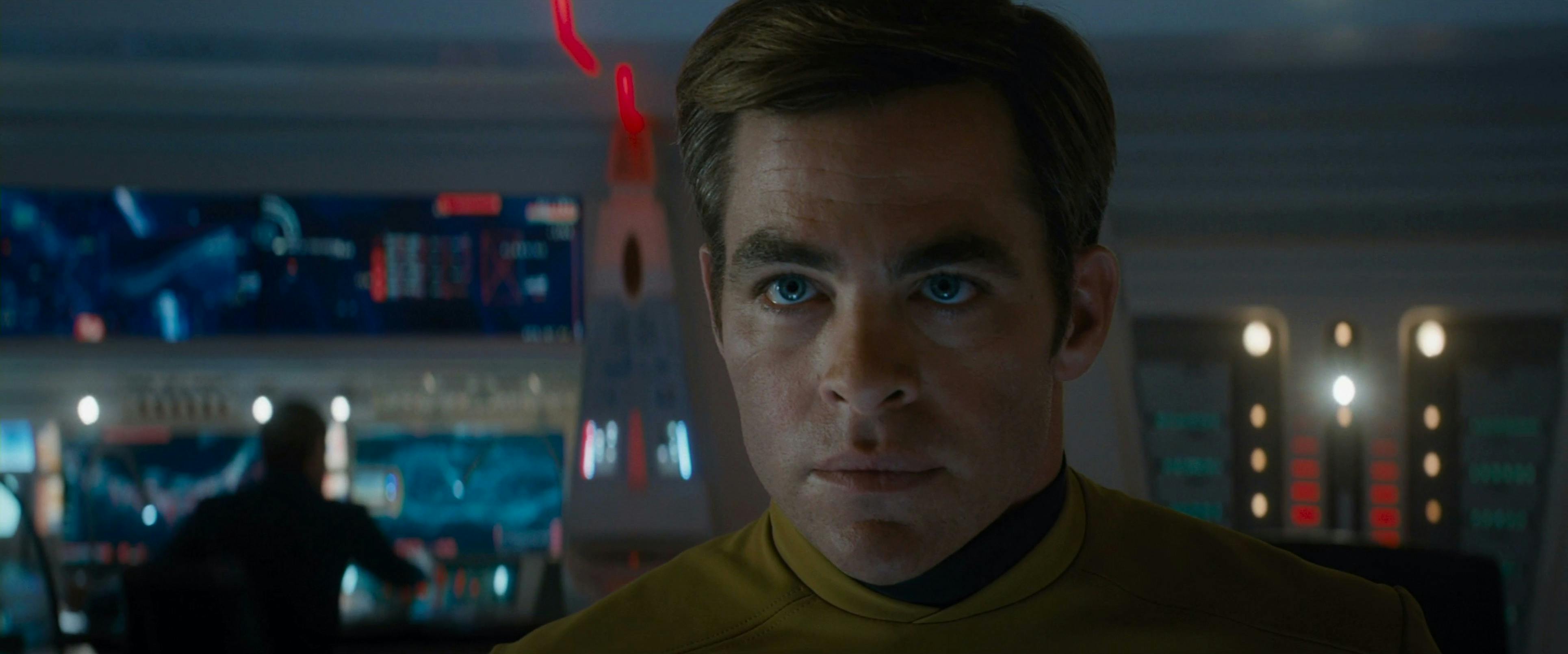 Kirk looks ahead at the viewscreen realizing the Enterprise is going down for real this time in Star Trek Beyond