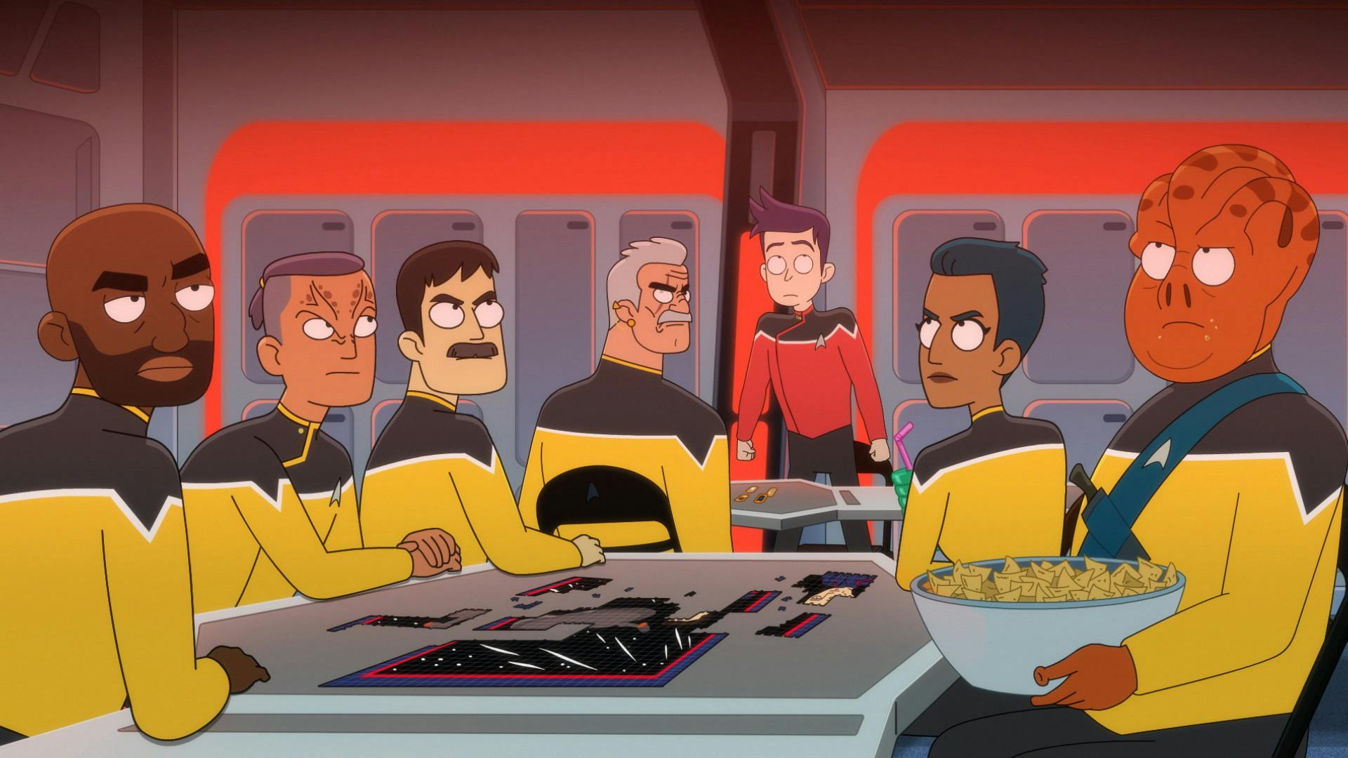 In the Cerritos' security training room, the officers surround an incomplete jigsaw puzzle as Kayshon holds a giant bowl of chips when they all look upwards as the klaxon goes off blaring a red alert in 'Empathalogical Fallacies'