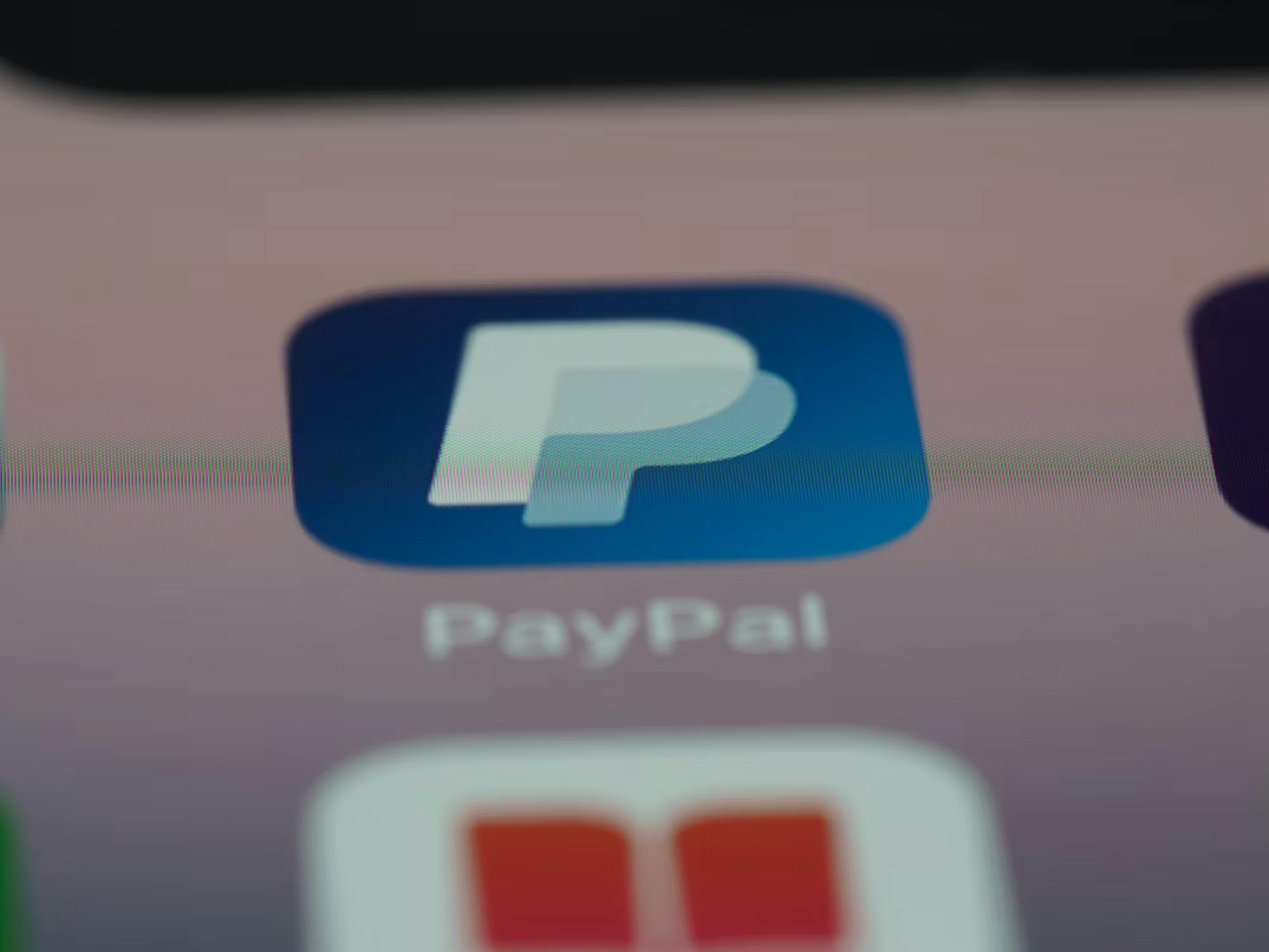 Photo of a PayPal application icon on a phone screen