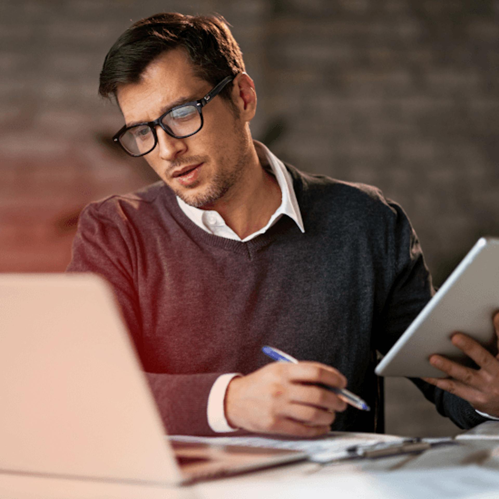 A man tracking his payments online.