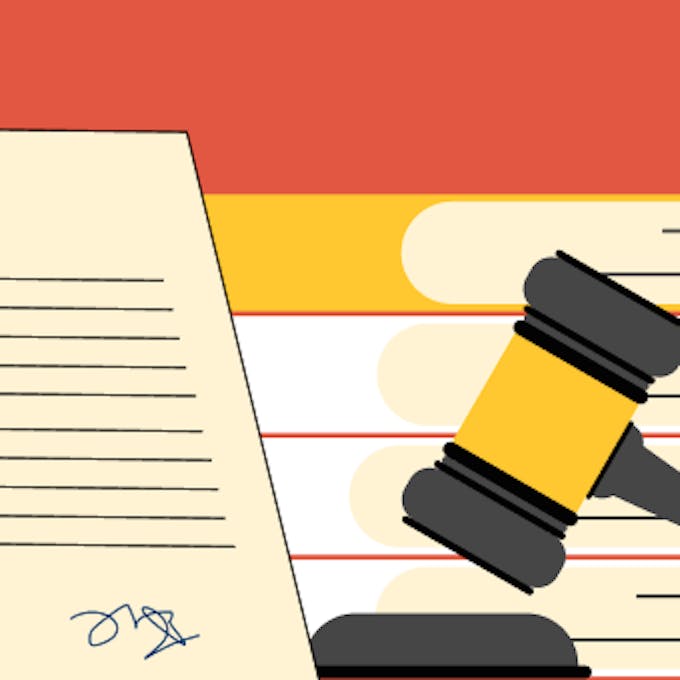 an illustration of a gavel and a piece of paper with a signature.