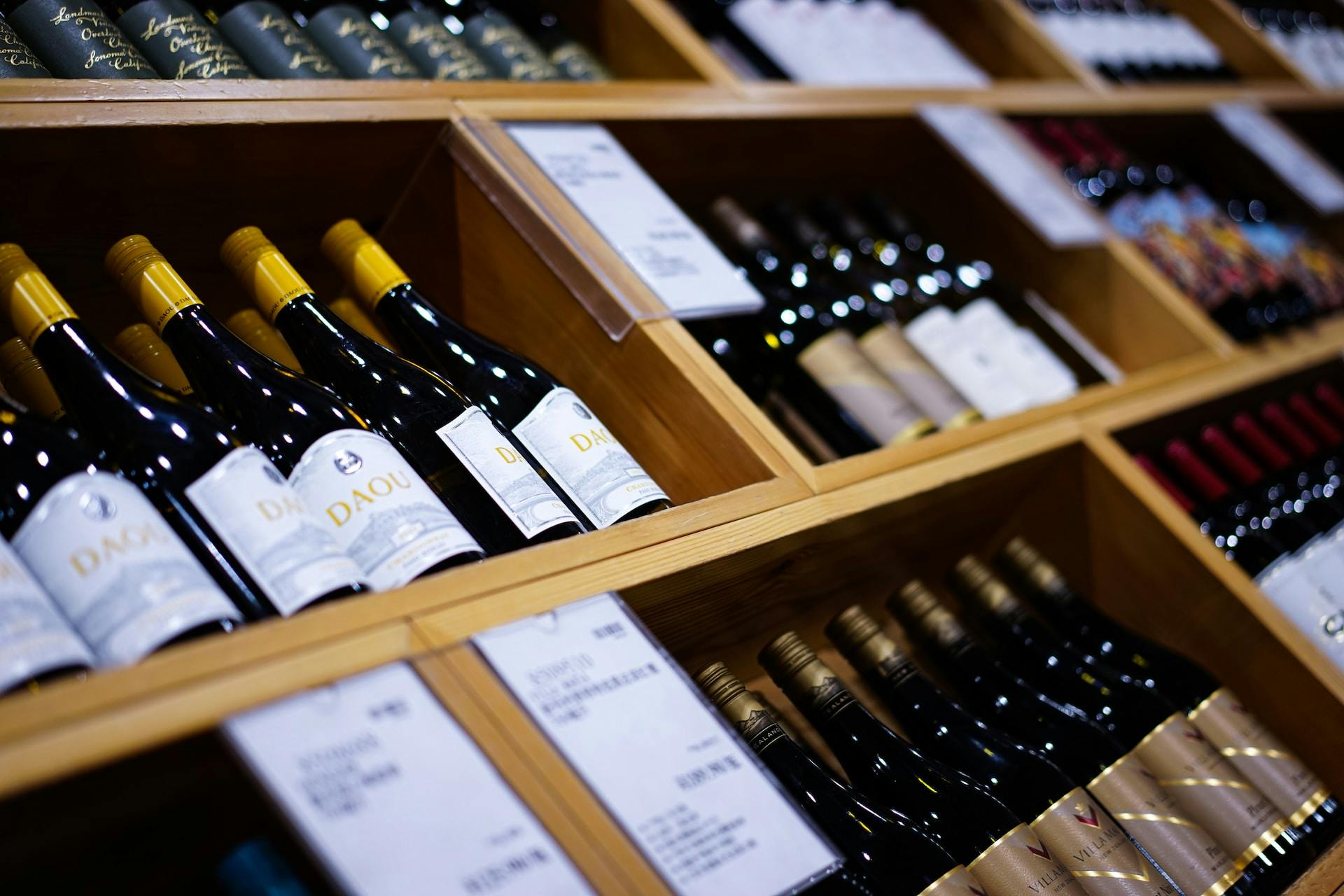 An image of wine bottles in a wine cellar