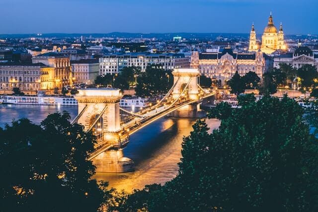 An image of the night scene in Hungary with the view of the bridge