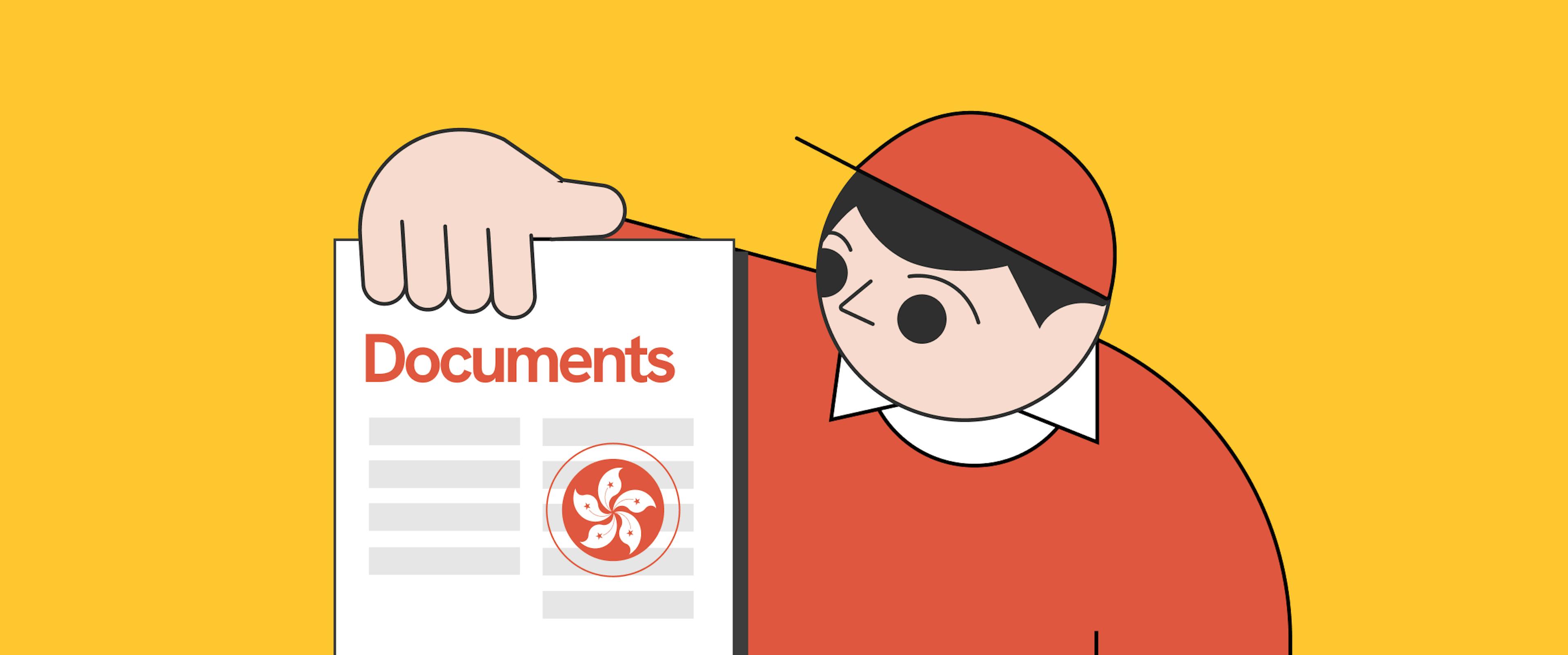 Man holding up a set of Hong Kong documents