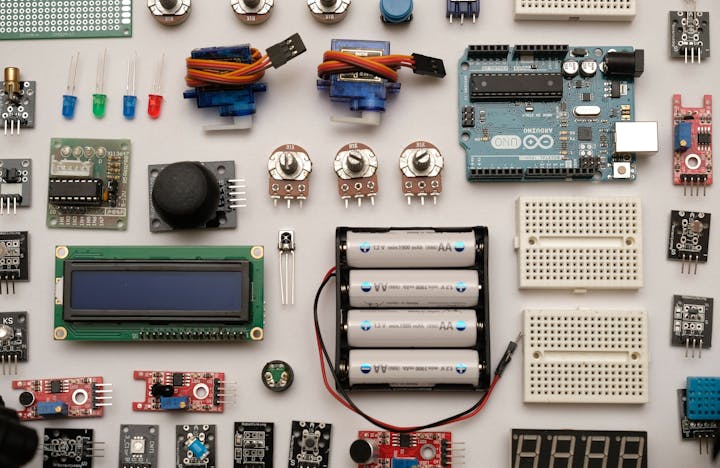 A flat-lay image of electronics and parts laid out