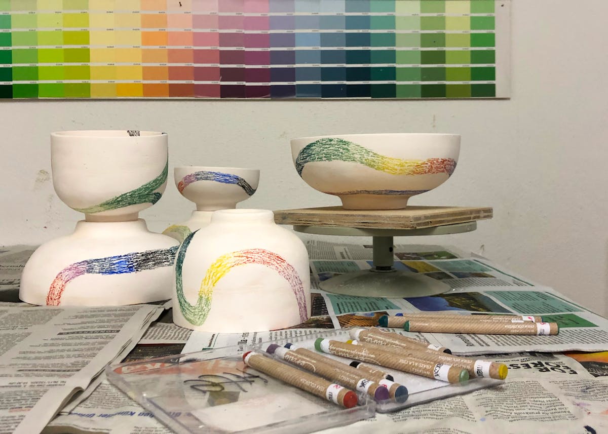 Painting the porcelain bowls
