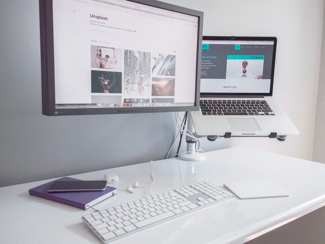A laptop computer connected to an external display