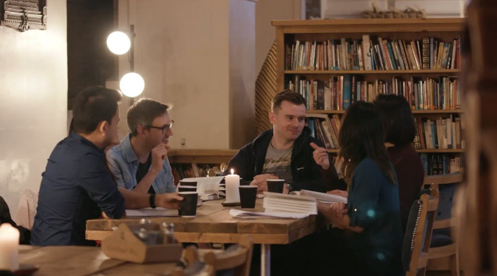 Group talking in library