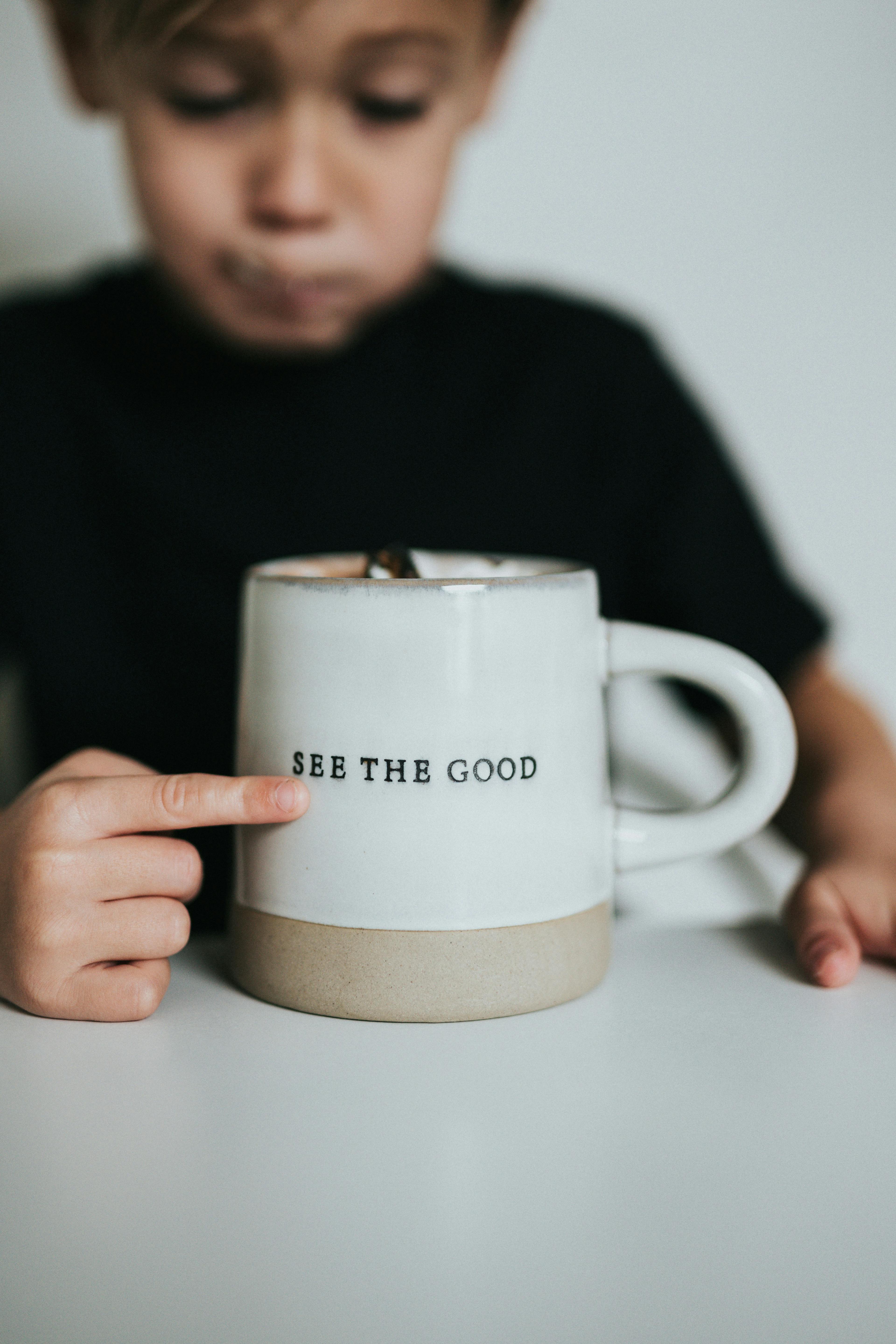 Hand pointing at cup which states see the good