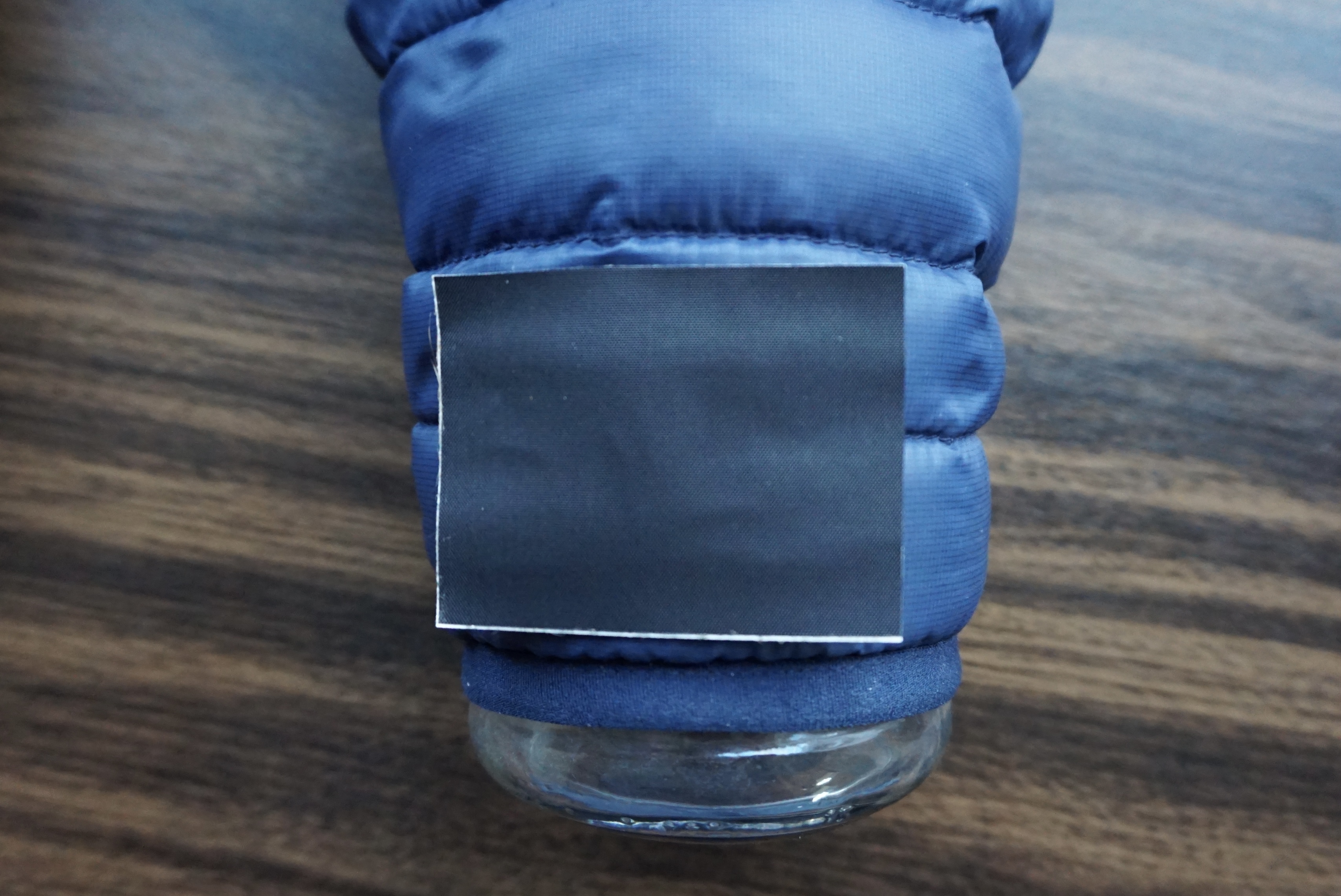 Image depicting scissors cutting a patch to size