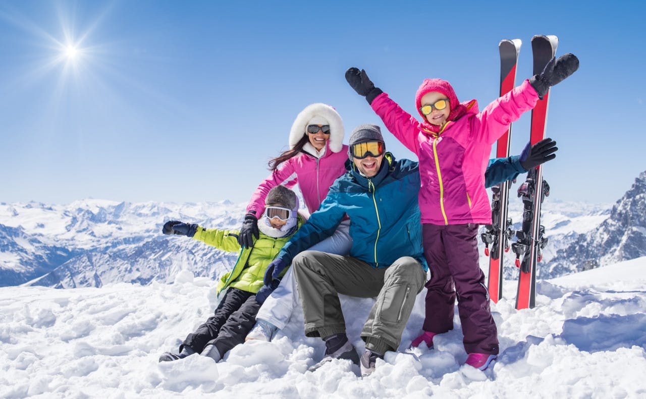 Happy family in winter holiday