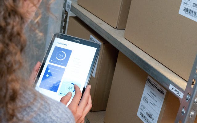 Employee is using the Stocktrace inventory software to do counting 