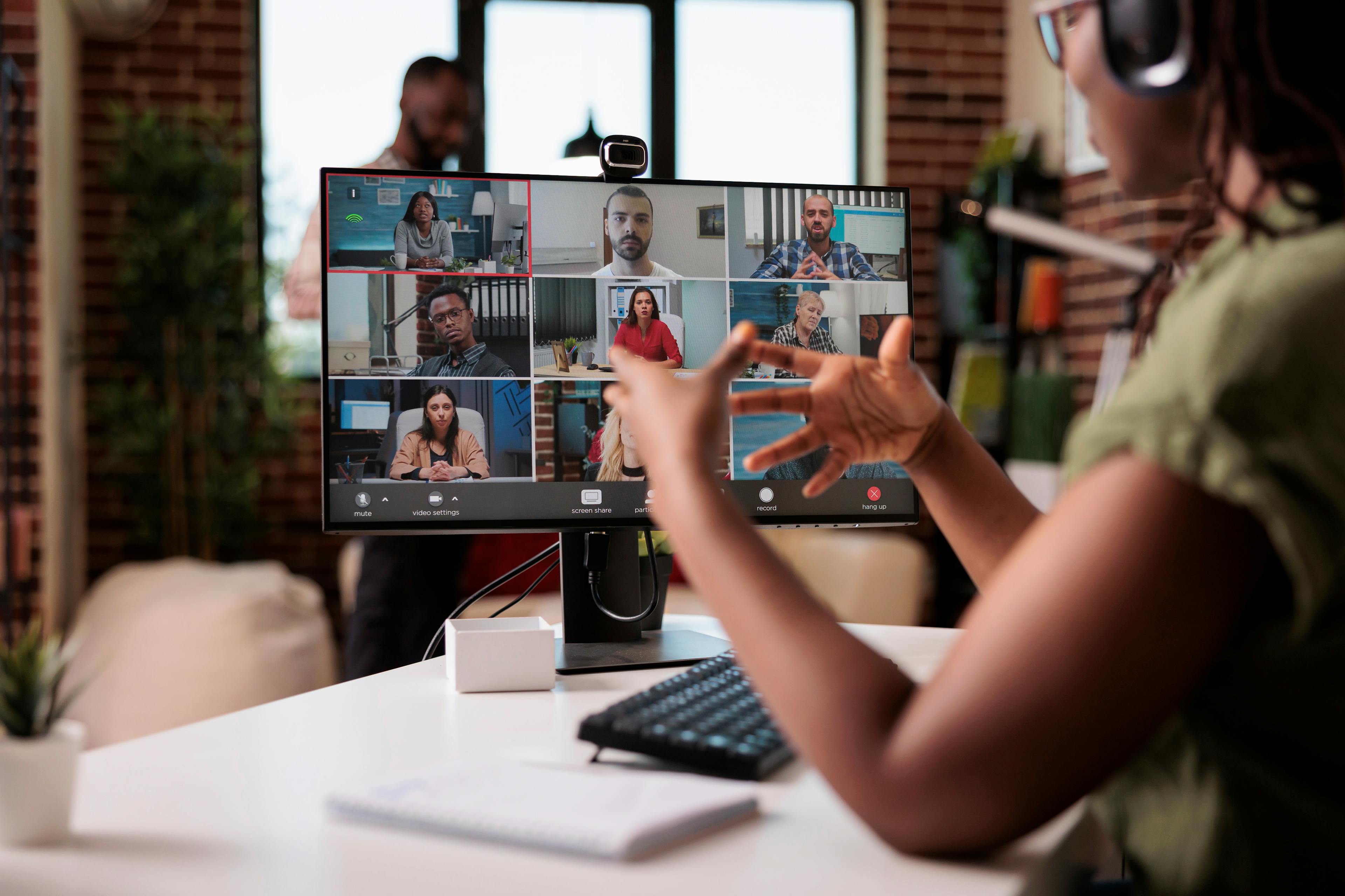 Image of people on a zoom meeting, a video thumbnail image for the Beliefs section of "our culture" 