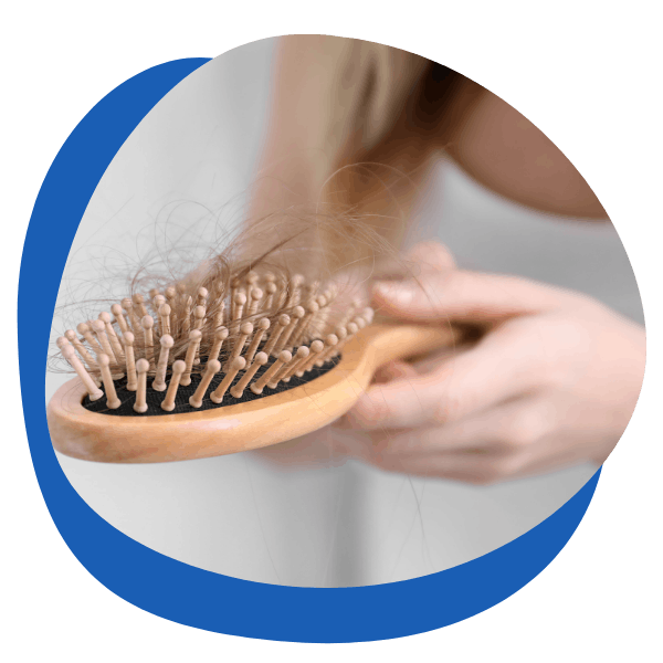 a woman's hair brush with hair lost in the bristles - round icon for women's hair retention treatment category from My Private Pharmacist Online pharmacy