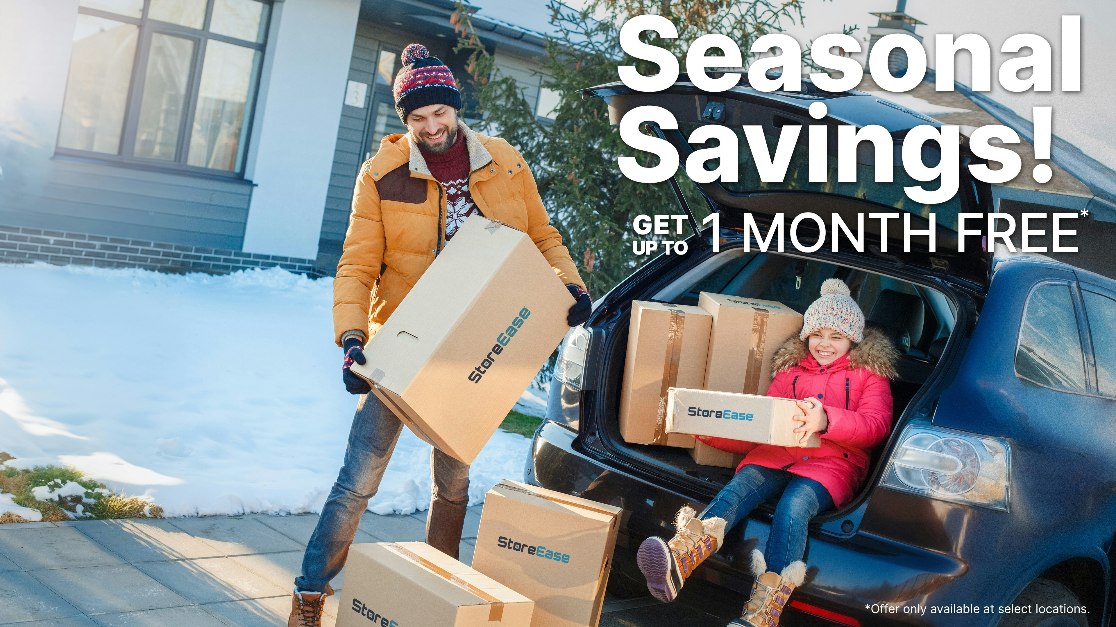 man bundled in winter clothing, moving storage boxes into car