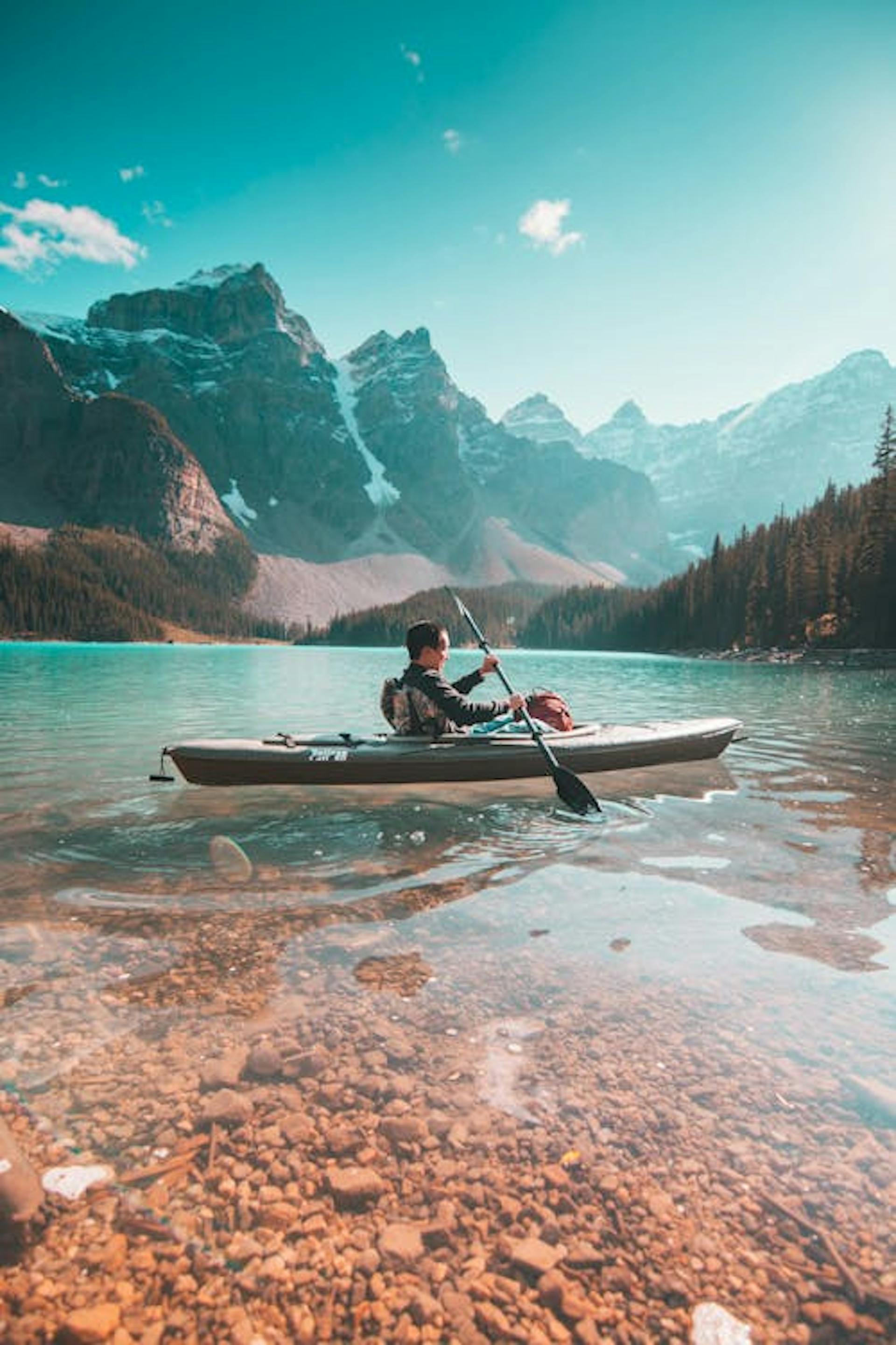 person riding on a kayak