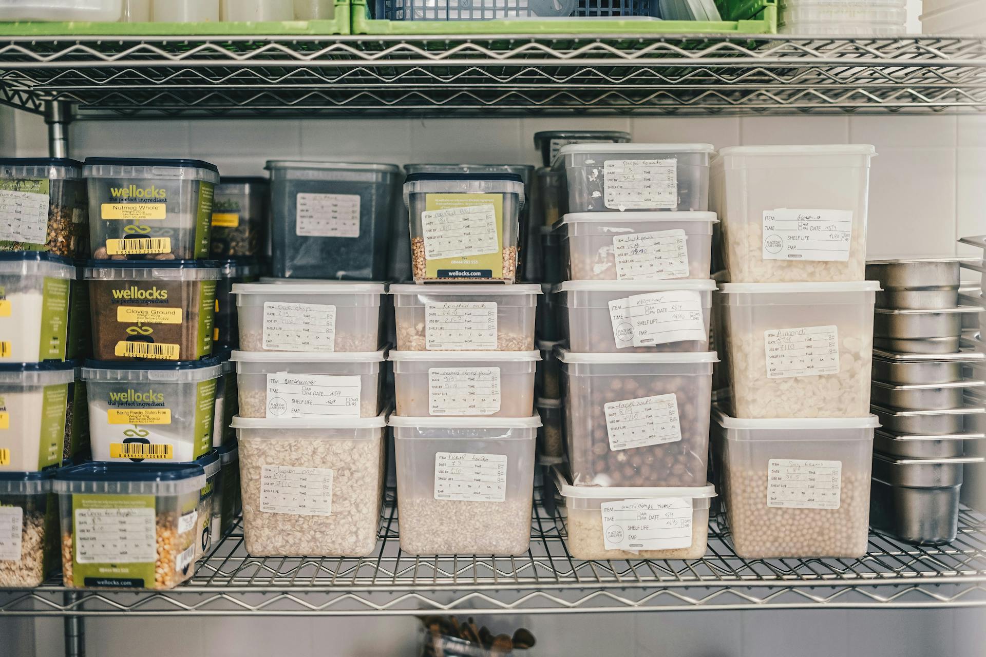A shelf full of food in air-tight storage containers