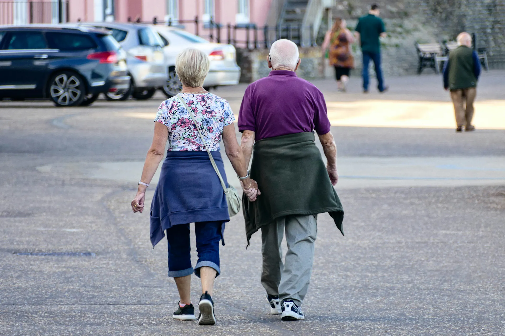A retired couple enjoying an urban walk through Lakeland, Florida.