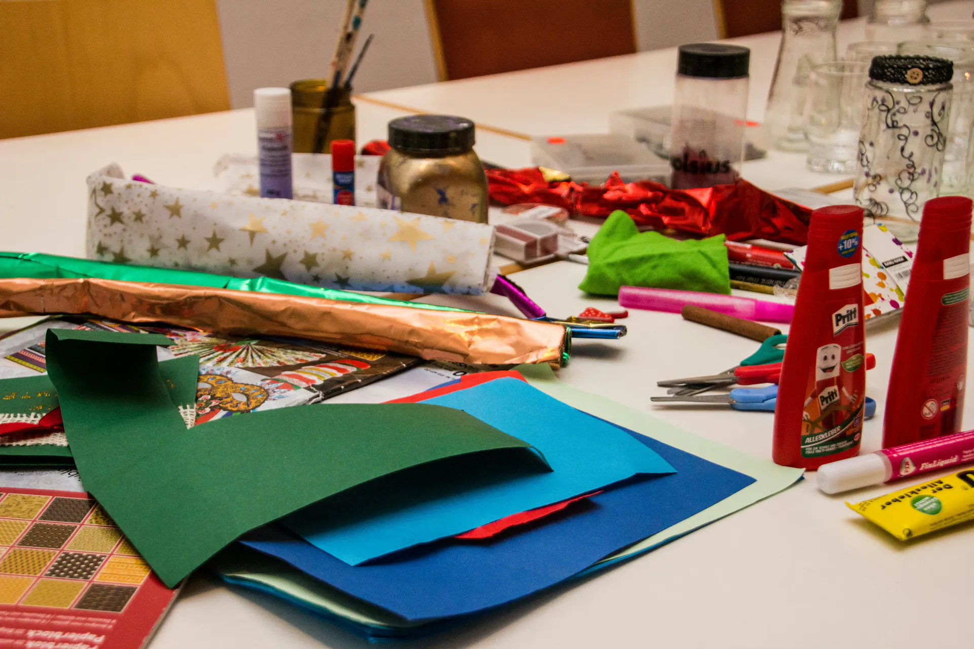 A table covered with a variety of crafting materials