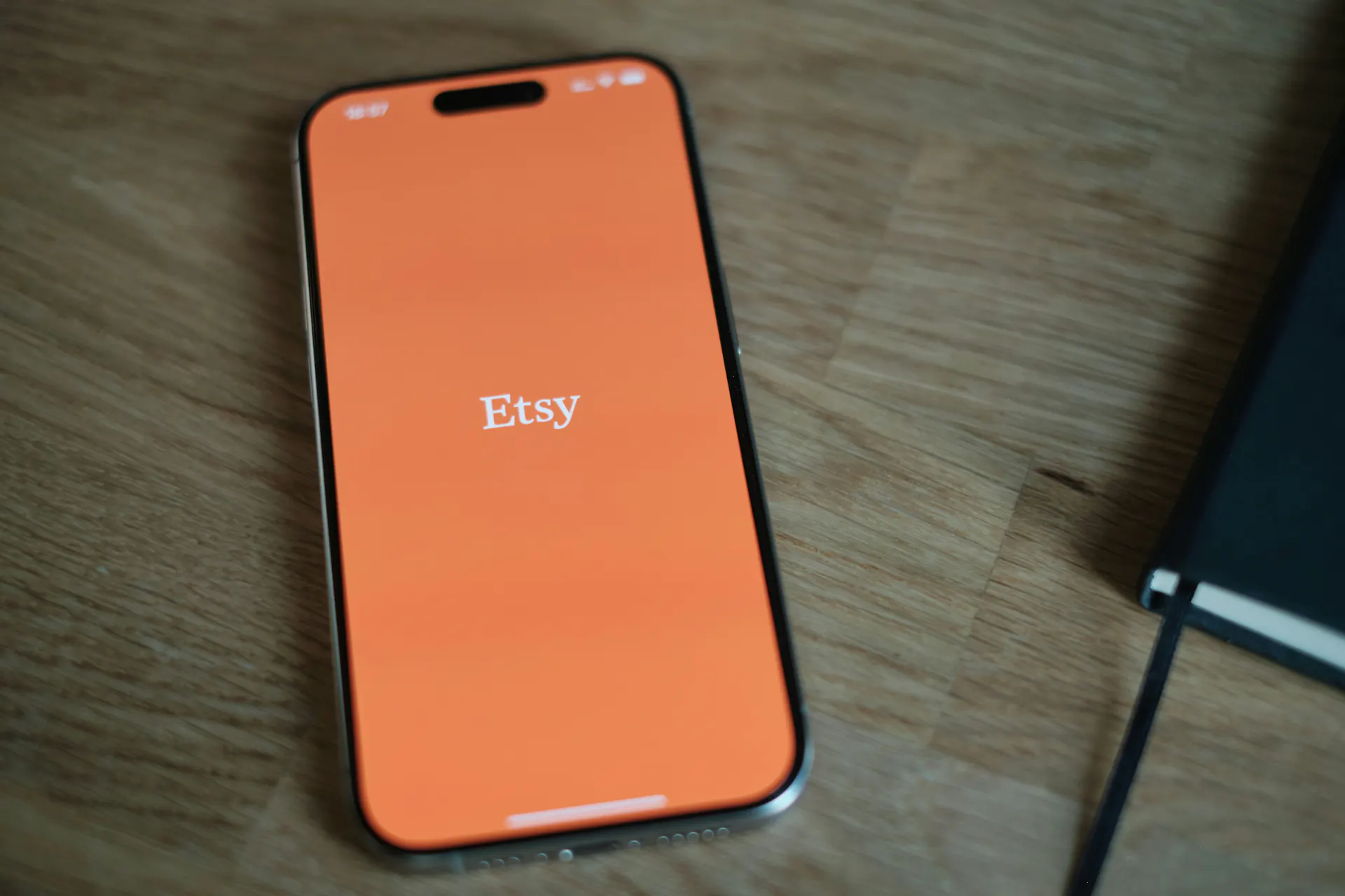  A close-up of the Etsy homepage on a phone screen