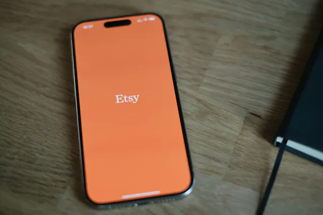  A close-up of the Etsy homepage on a phone screen