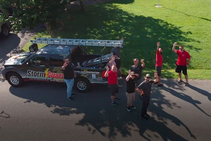 Storm Guard of Nashville Roofers Smiling and Waving in Thompson Station, Tennessee