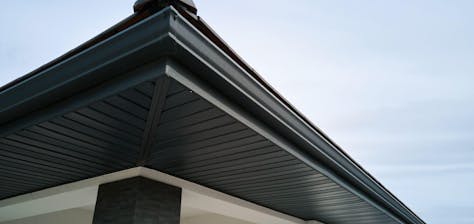 black gutters on residential home