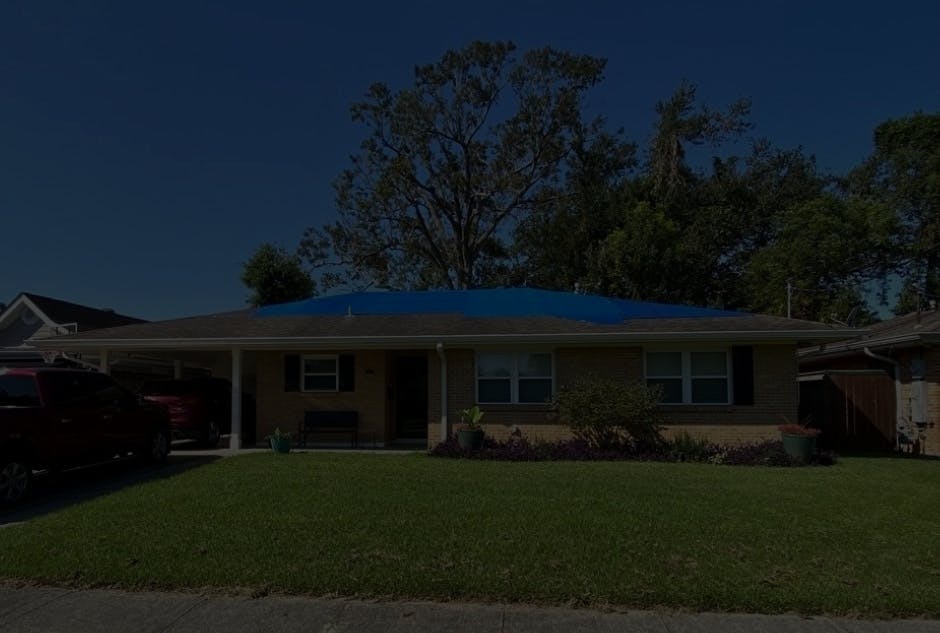 emergency roof tarping on home in New Orleans