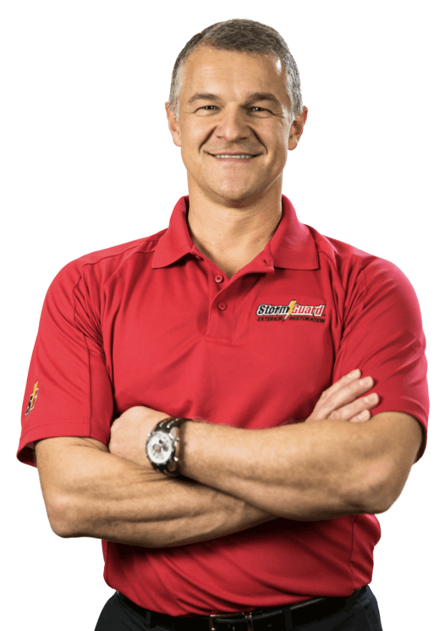 Storm Guard representative wearing a red Storm Guard shirt