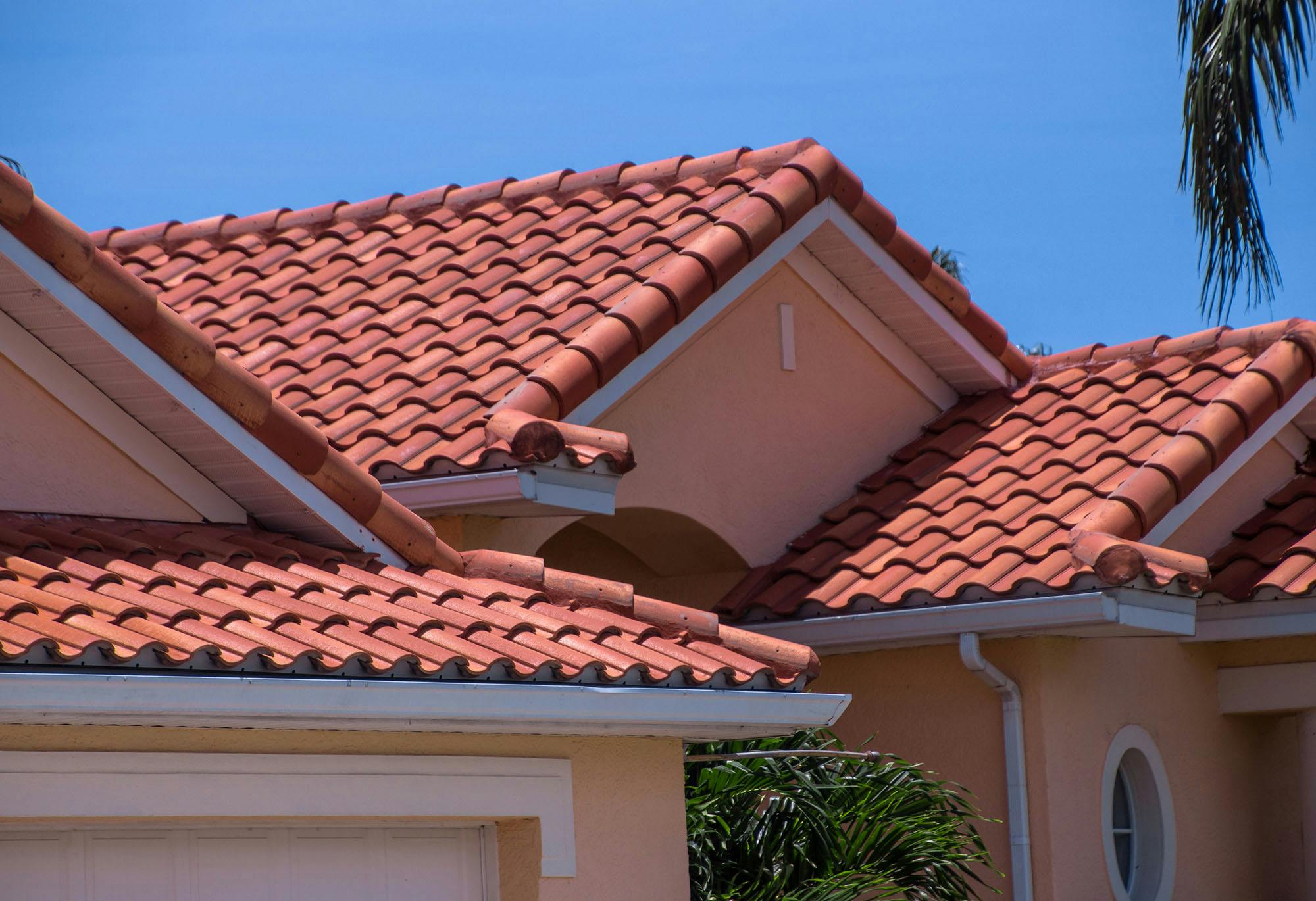 home with red clay tile roof