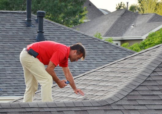 Man doing a roof inspection