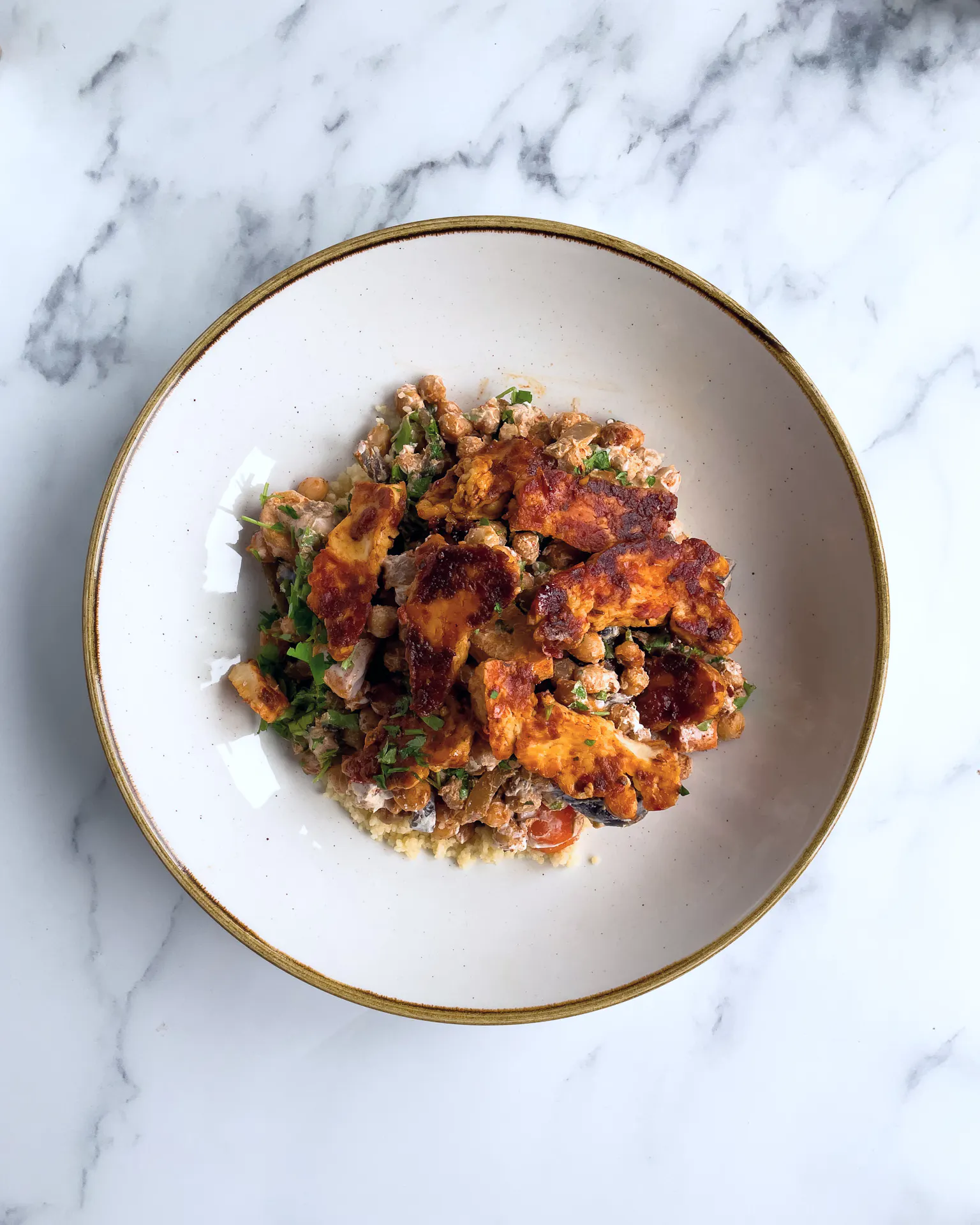Harissa halloumi with couscous & yogurt dressing - Stryve