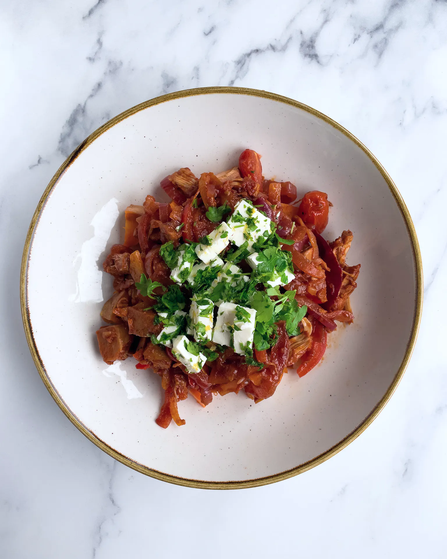 Jackfruit-loaded sweet potato with feta - Stryve