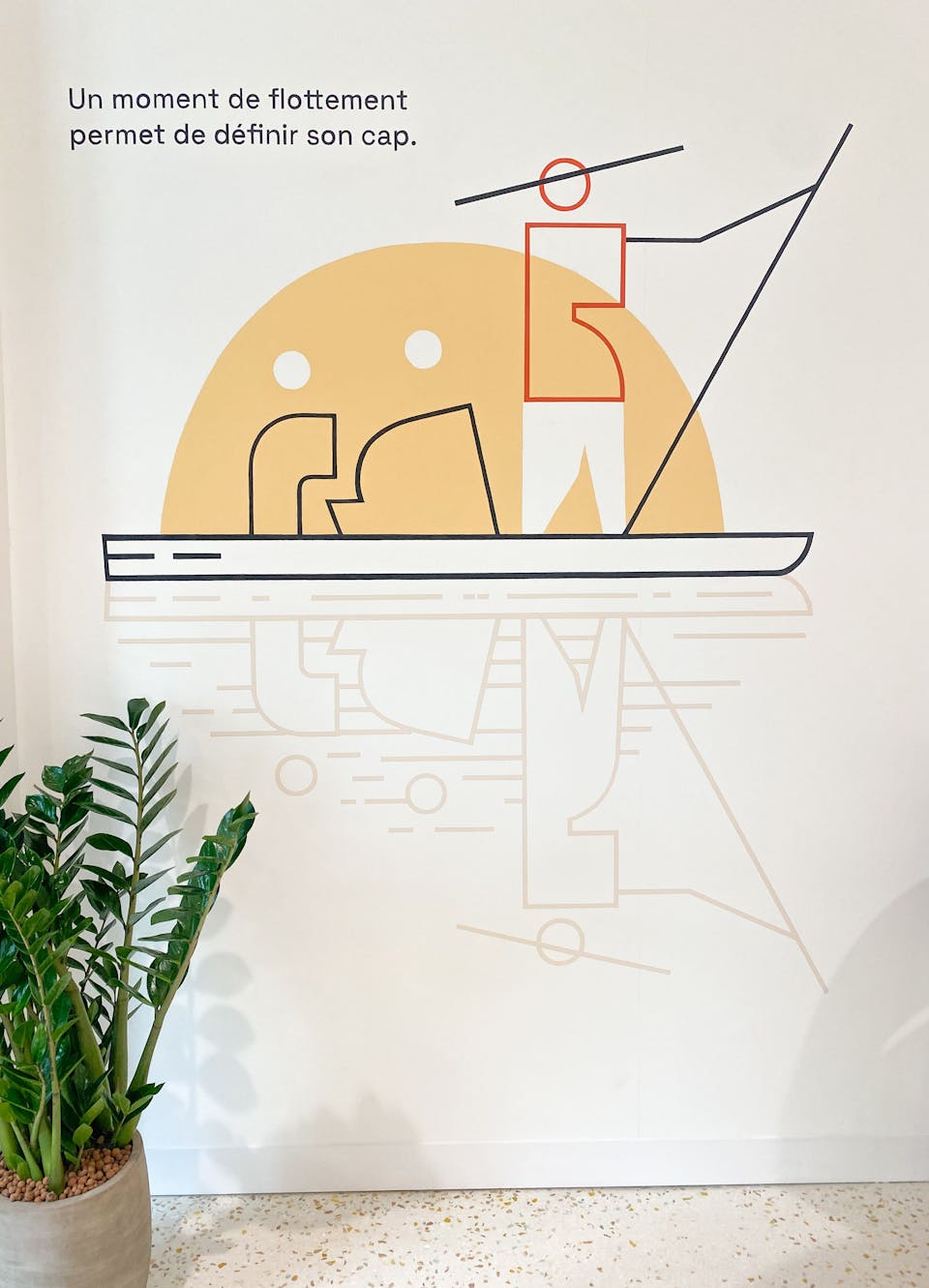 Une illustration filaire symbolisant des personnages voguant sur l'eau à l'aide d'une barque, apposée par sticker dans le cadre de l'aménagement de la Maison de l'Entreprise à Saint-Nazaire par l'agence de design Studio Katra.