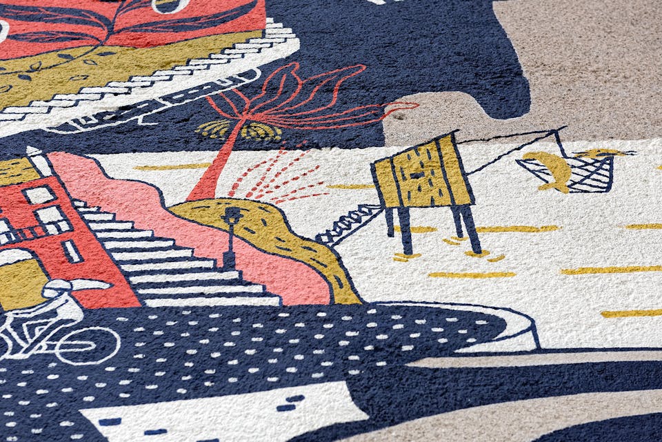 Zoom sur les détails de la fresque murale extérieure du studio de design Studio Katra.