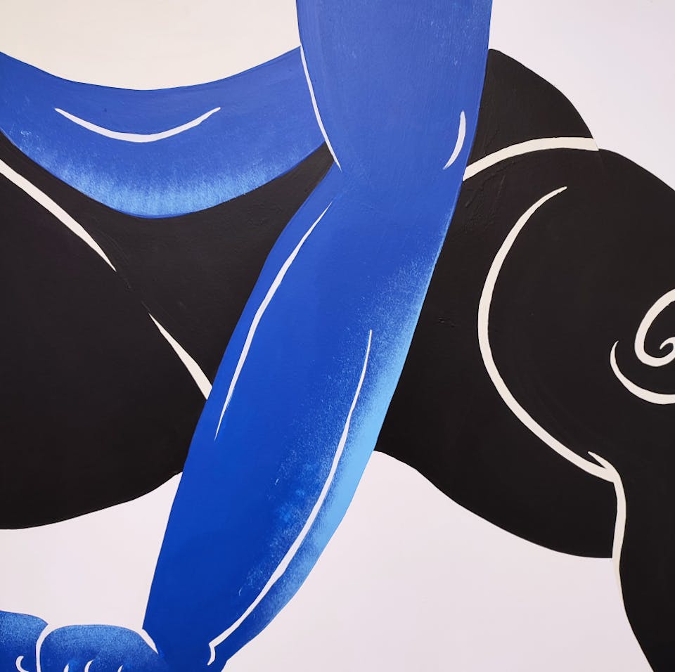 Zoom sur l'une des fresques de l'agence de design graphique Studio Katra au sein d'Intersport Paris-les-Halles, représentant un personnage soulevant un haltère.