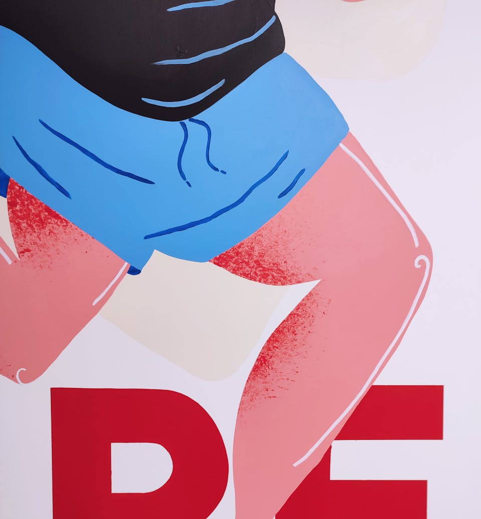 Zoom sur l'une des fresques de l'agence de design graphique Studio Katra au sein d'Intersport Paris-les-Halles, représentant les jambes et le short d'un skateur.