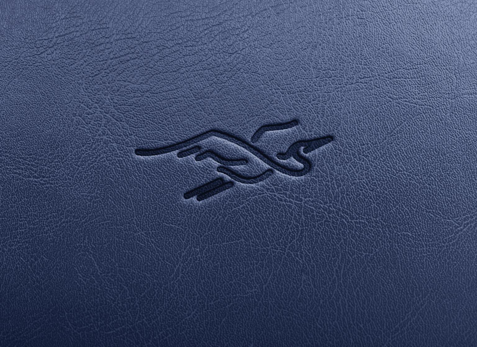Sigle du héron Valeuriad en plein vol, apposé sur une couverture en cuir.