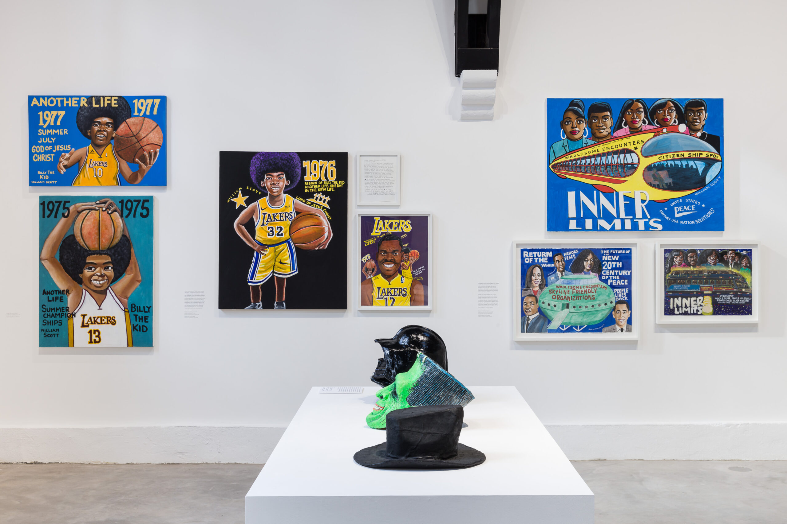 A colourful painting features a green UFO labelled “Wholesome Encounters Skyline Friendly Organisations” with stairs. Surrounding it are portraits of four smiling Black individuals and Martin Luther King Jr. Bold text reads phrases about peace and the future.