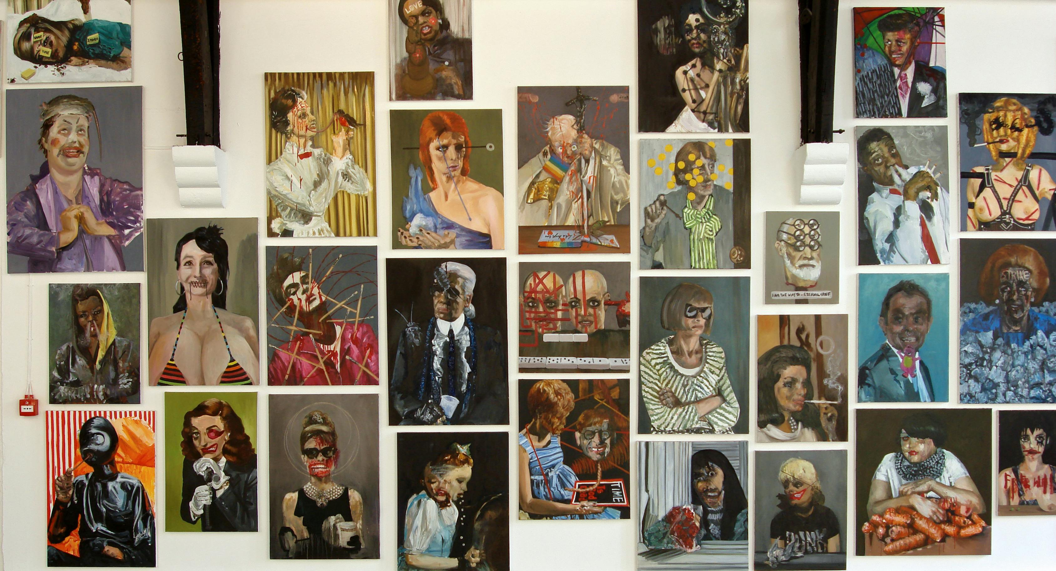 White gallery wall covered in satirical painted portraits, including many pop culture icons.